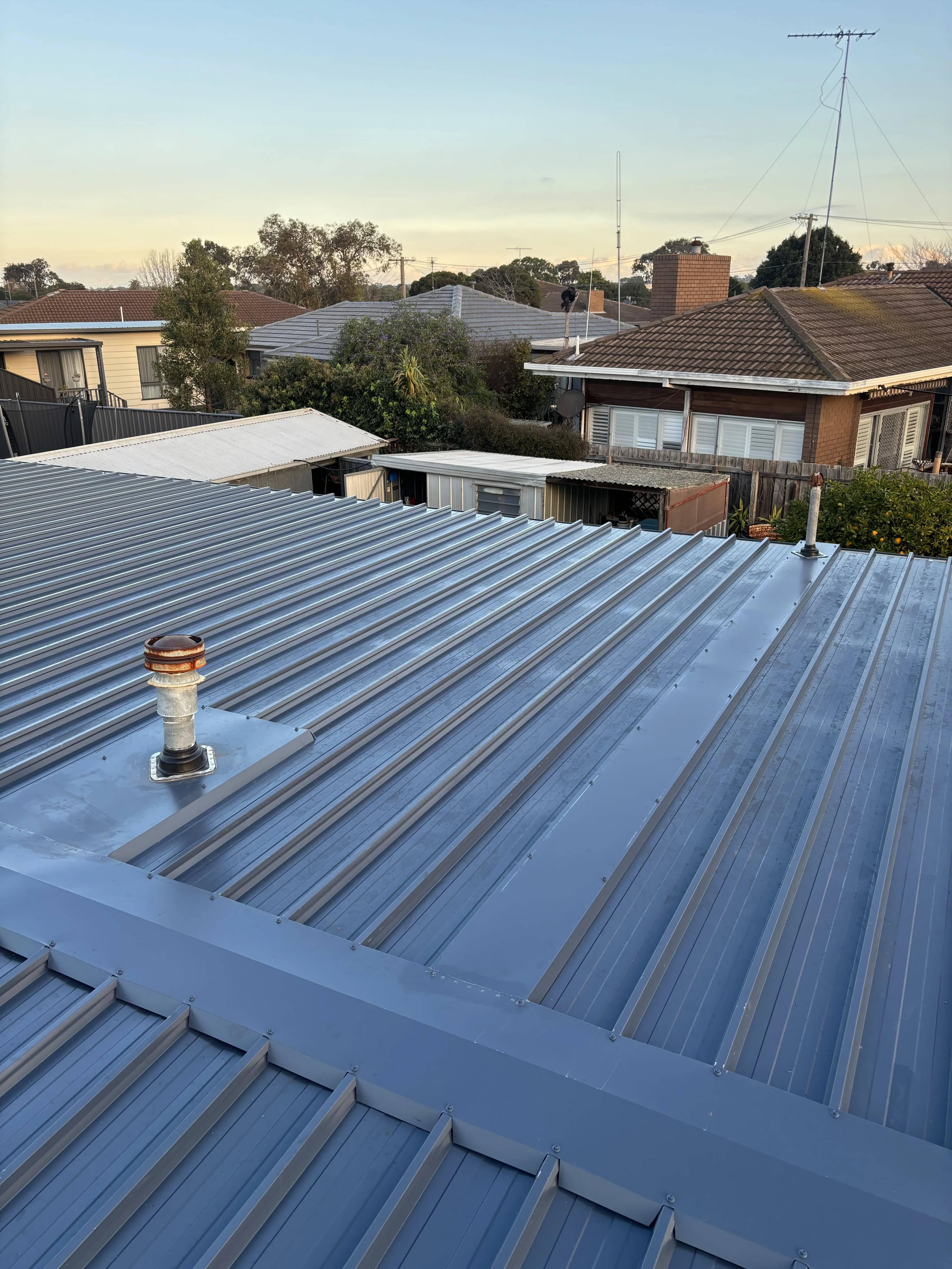 Metal re-roofing in Deep Ocean colorbond finish