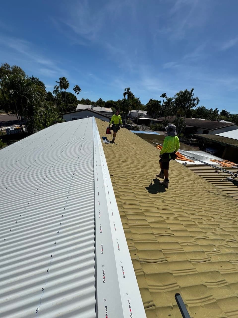 New Colorbond roof installation team on site – Skyways Roofing