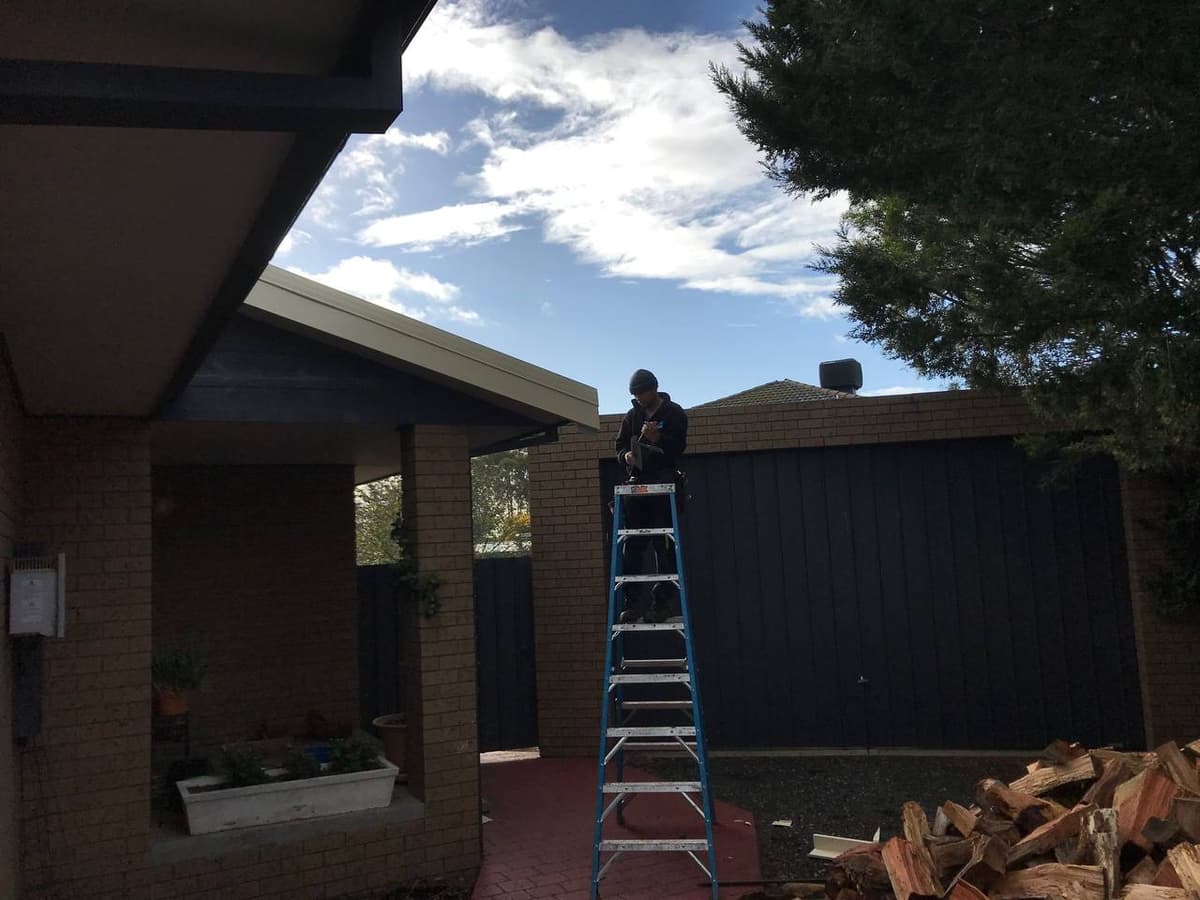 Gutter inspection from ladder Geelong – Skyways Roofing