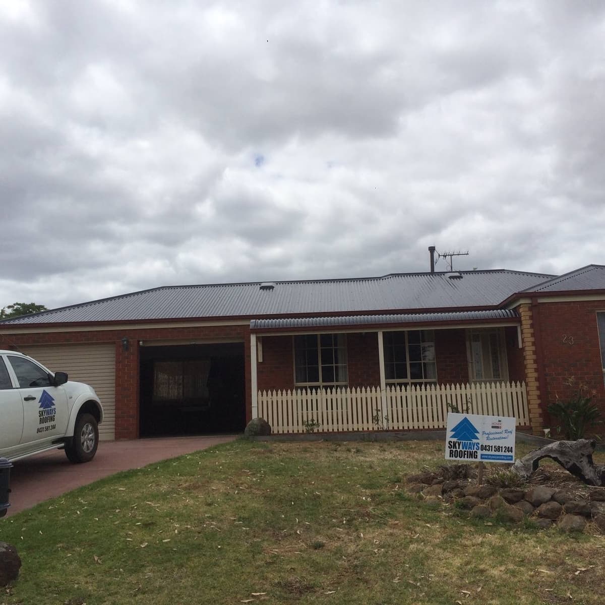 Completed metal roof restoration with Skyways signage Geelong